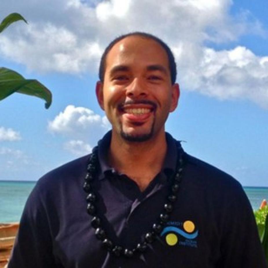 Leonard Pace wearing blue shirt in front of ocean